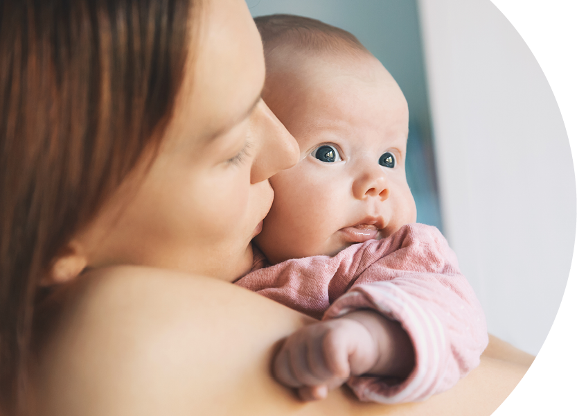 Mother holding her baby