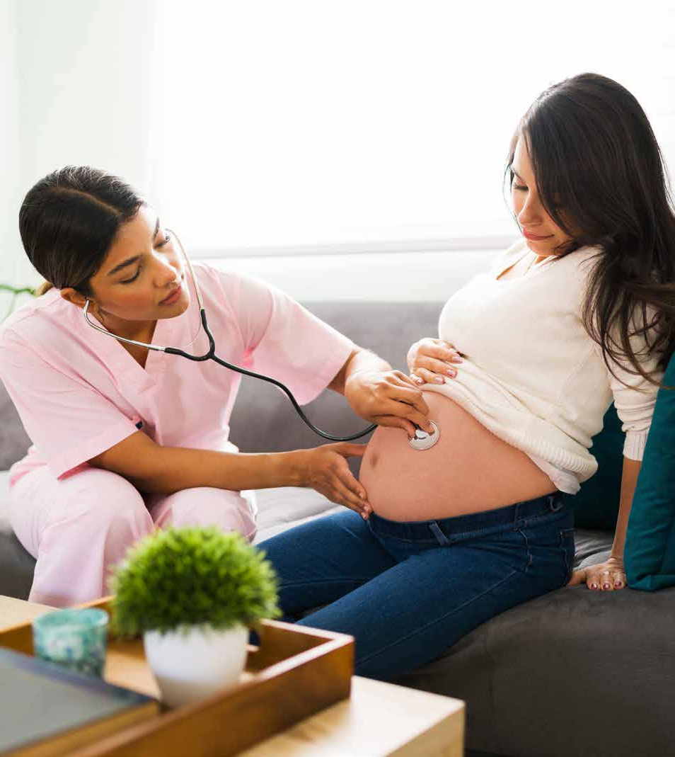 Home visitor supporting a pregnant mother during pregnancy